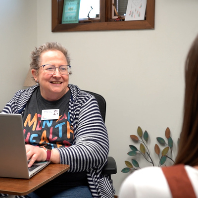 Marilyn Fronk, Access Clinician assists a new client through the Same Day Access process.