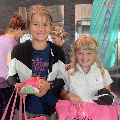 GOTR Soles provides girls with a need with new running shoes and sports bras.