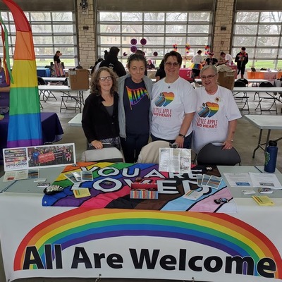 Little Apple Pride! We love walking in the parade and visiting with neighbors at our booth.