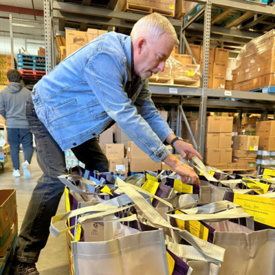 Volunteer finds guests' Thanksgiving order.