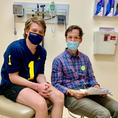 Jace with research/clinician Dr. Carl Koschmann of Michigan