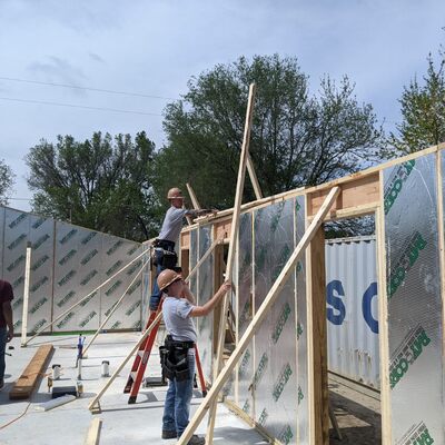 Installation of wall panels at Build 30 in Ogden