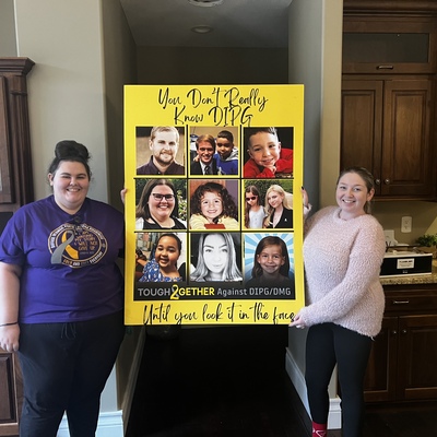 Nicole and Lilly with other children impacted by Brain Cancer