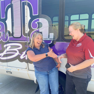 Karla (FHBB Director) and Anne (FHATA Director) meets about bus donation.